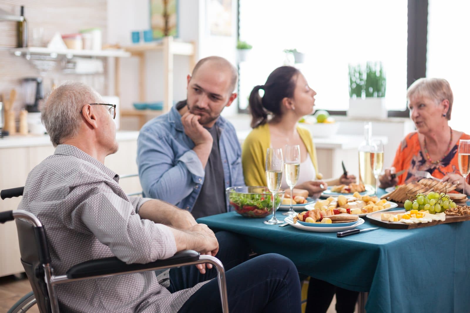 Senior veteran with family at home