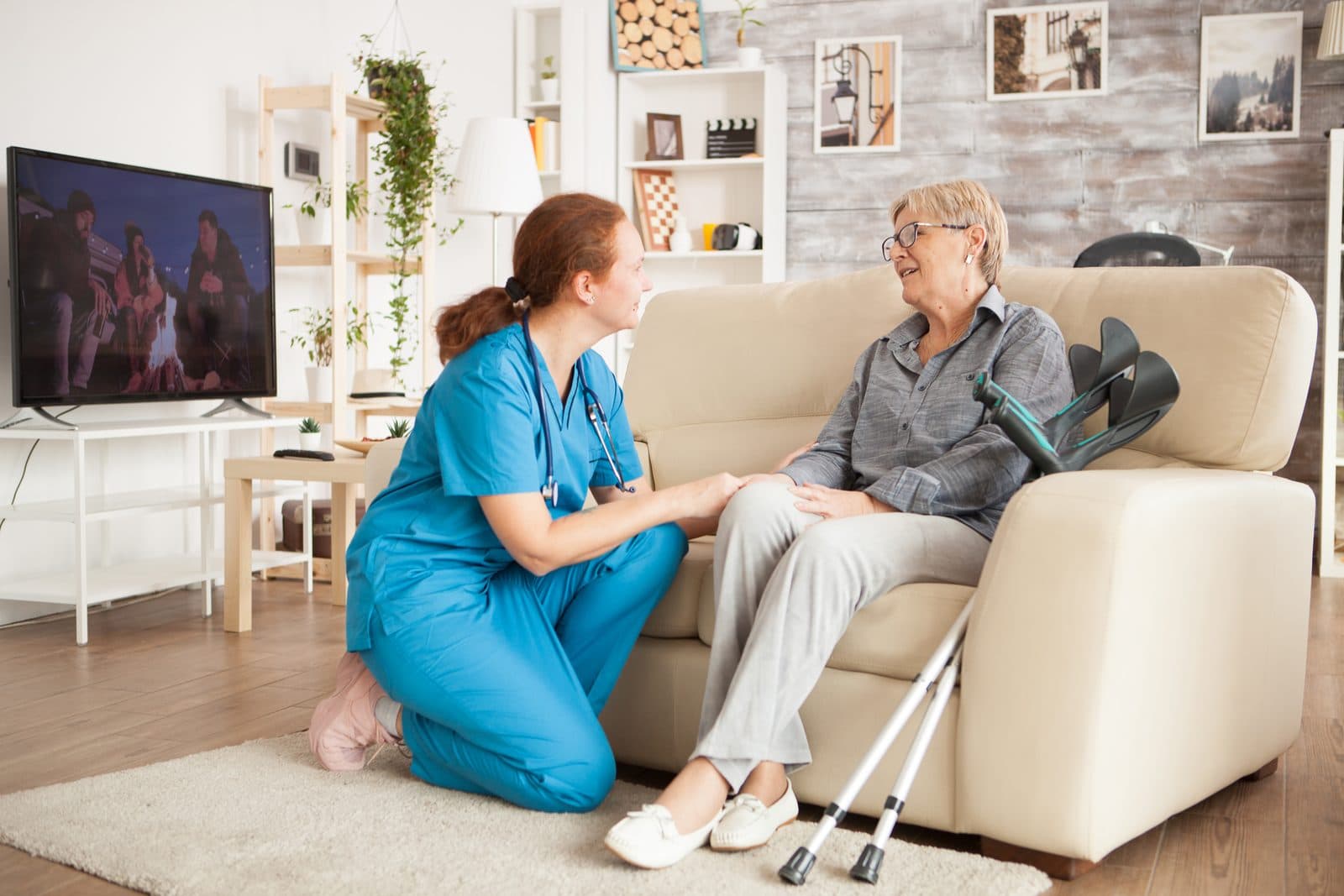 Nurse with resident in memory care home
